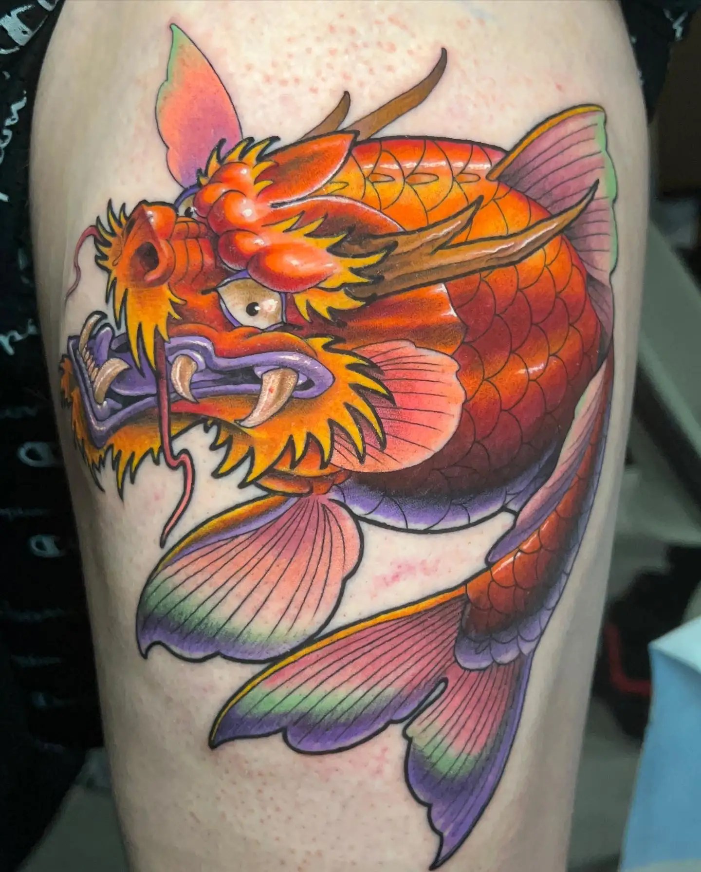 New school styled tattoo of a koi fish with a dragon head