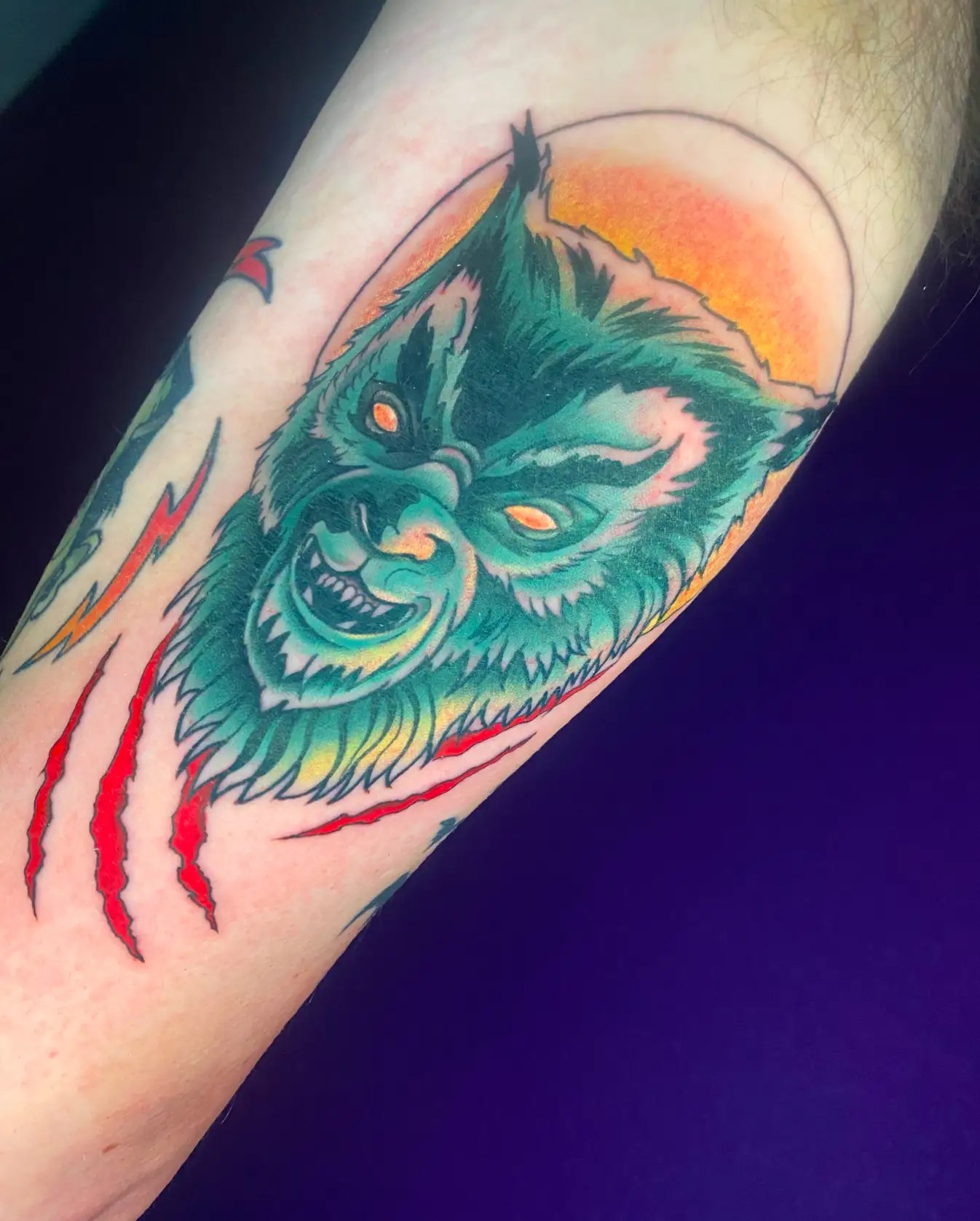 Colorful werewolf tattoo