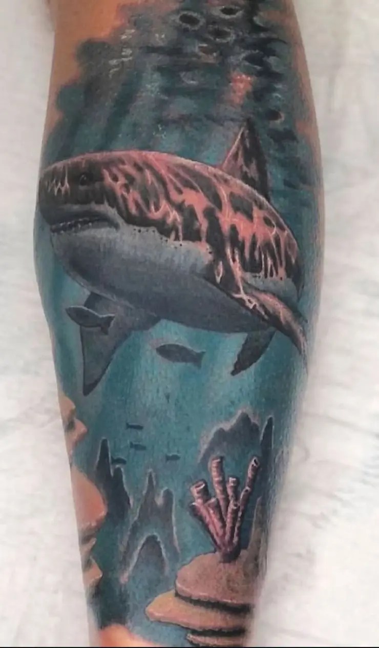 Realistic tattoo of an underwater scene with a tiger shark
