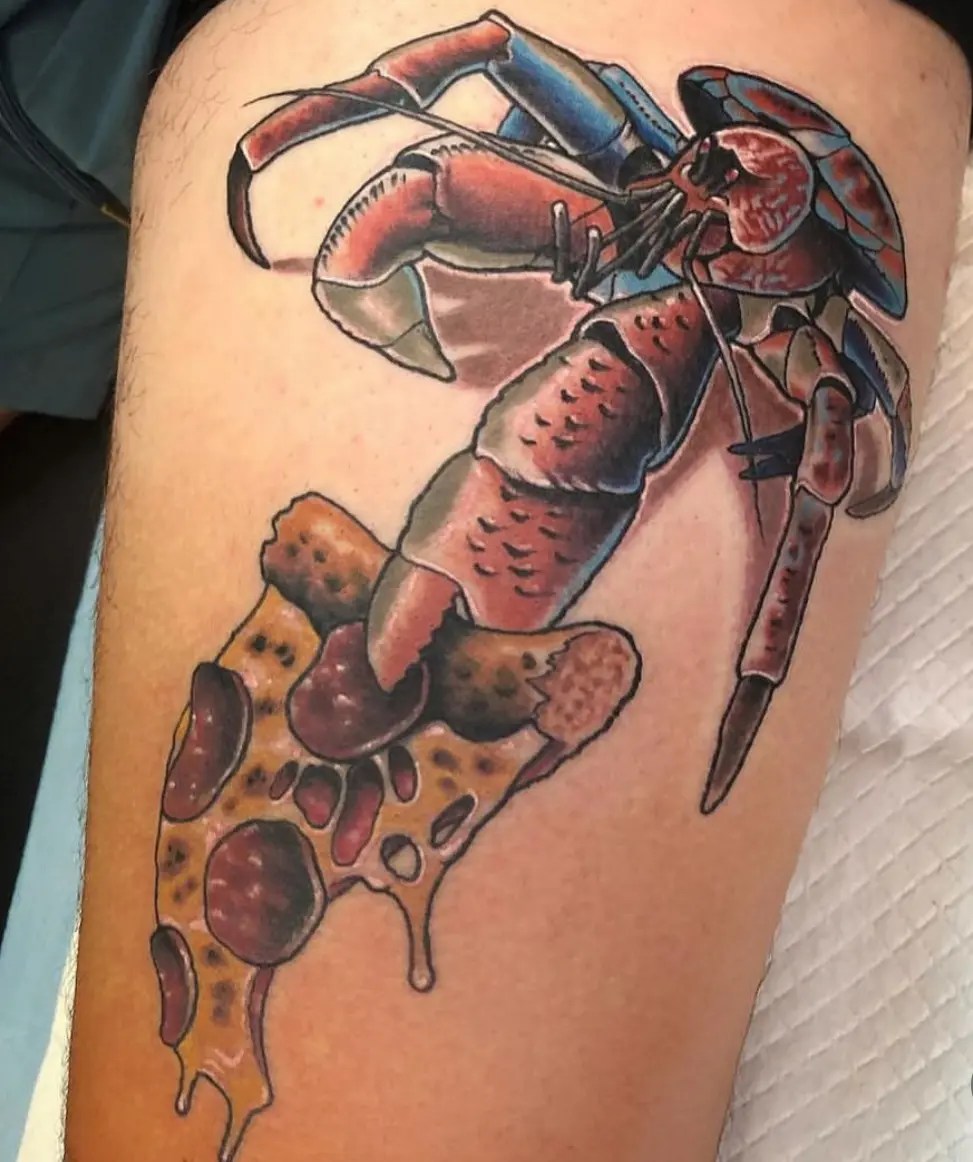 Colorful realistic tattoo of a crab with a slice of pizza