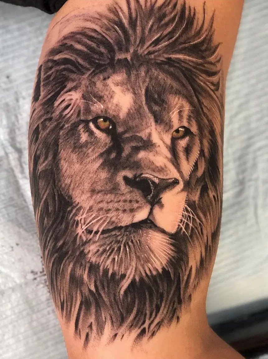 Detailed tattoo of a lion's head