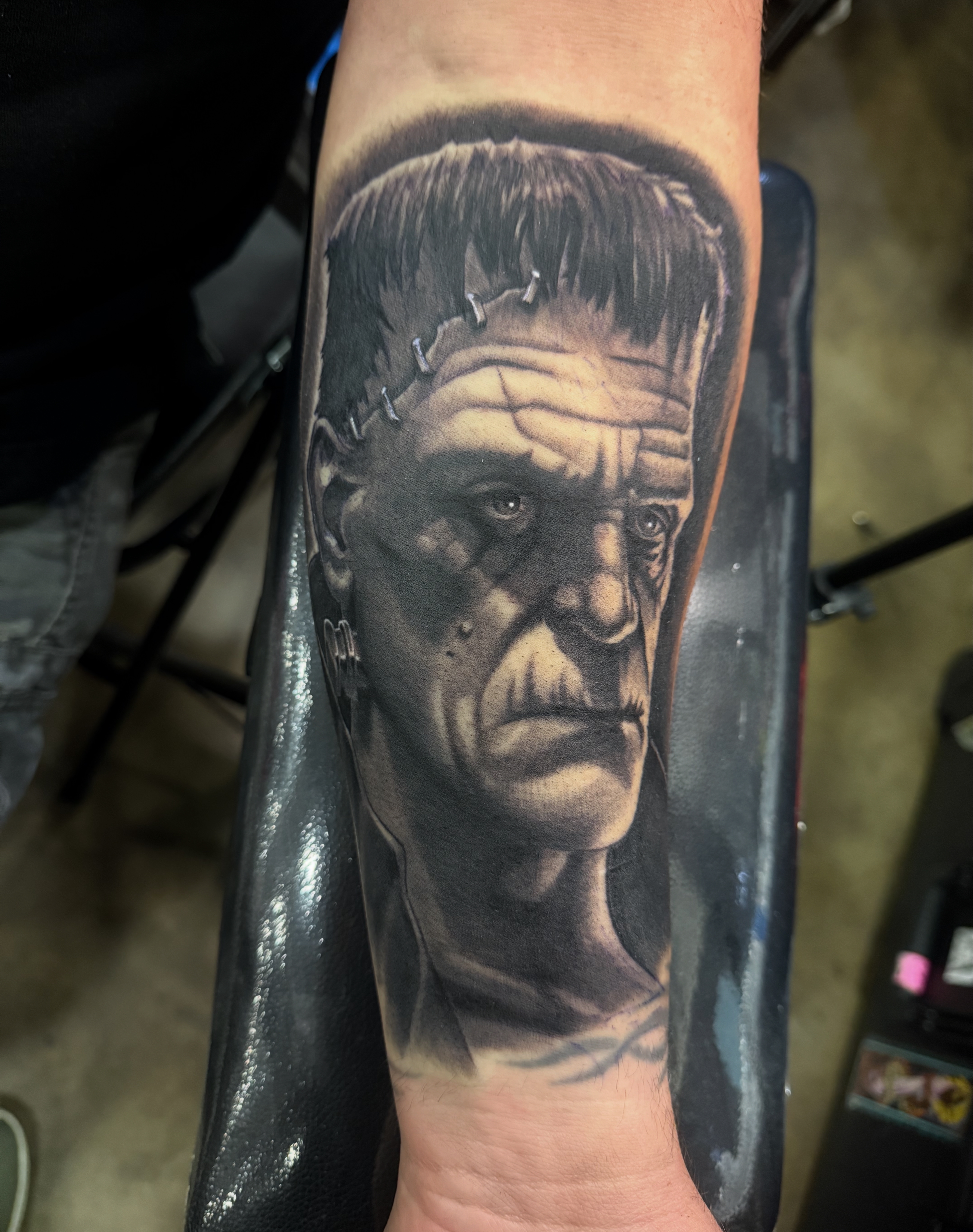 Black and grey portrait tattoo of Frankenstein's monster